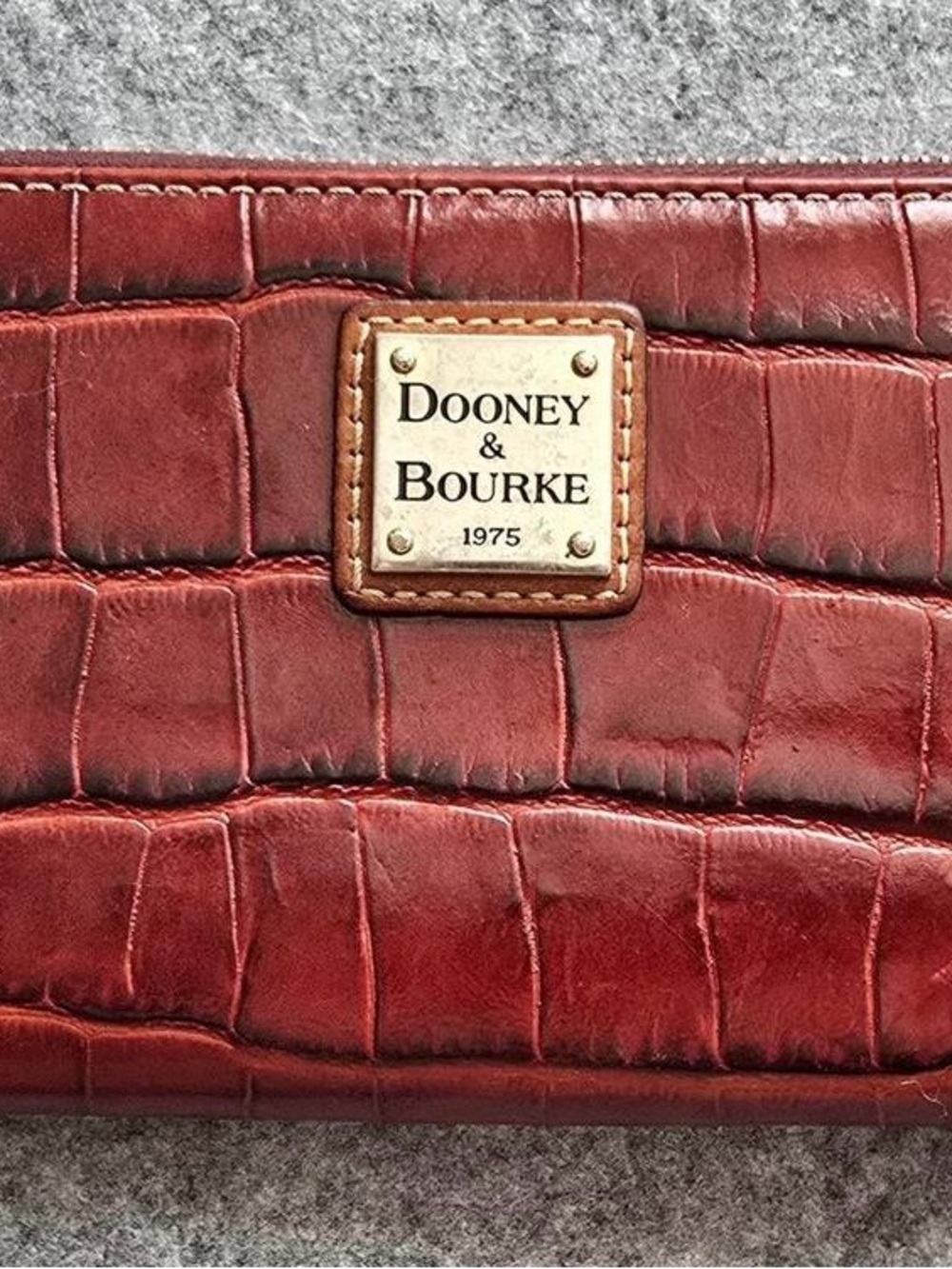 Dooney & Bourke Burgundy Croc-Embossed Leather Wallet with Gold Plaque